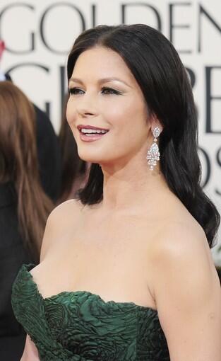 This Jan. 16, 2011, file photo shows actress Catherine Zeta-Jones as she arrives on the red carpet for the 68th annual Golden Globe awards at the Beverly Hilton Hotel in Beverly Hills, Calif.