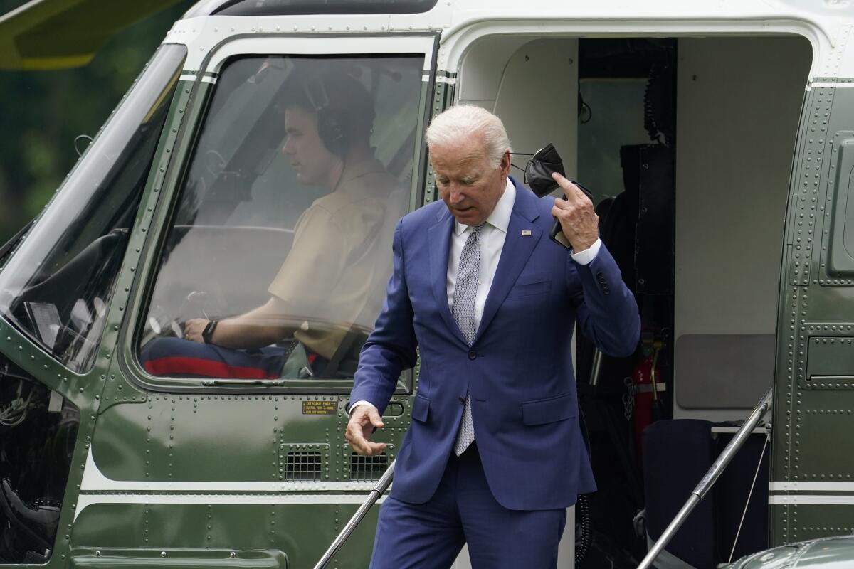 Joe Biden exits helicopter