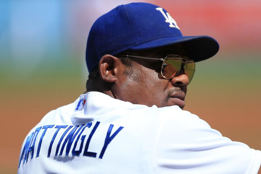Dodgers third baseman Juan Uribe did such a good impersonation of Manager Don Mattingly that it earned him a Dilbeck Baseball Award.