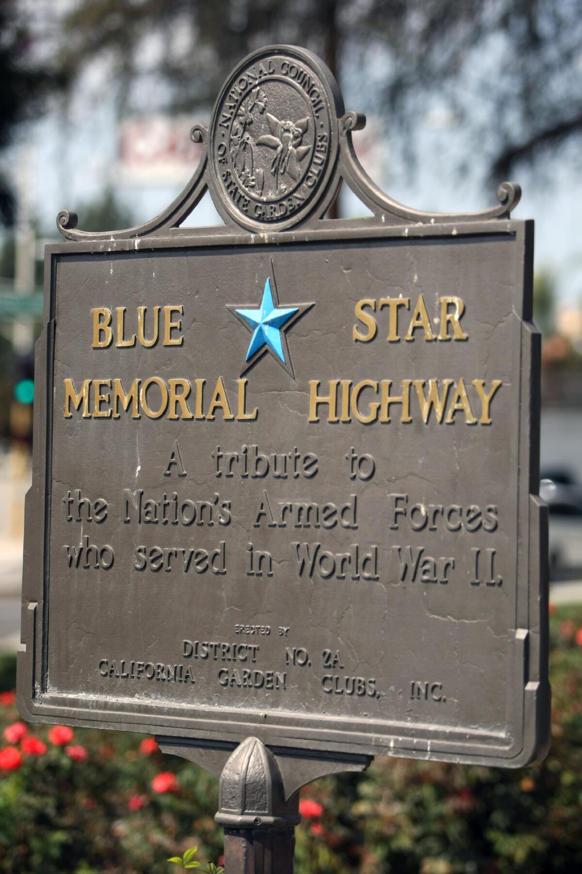 A sign designating the memorial as part of the Blue Star Highway honoring veterans. Burbank has received a grant from Los Angeles County that will allow them to refurbish the war memorial at McCambridge Park.