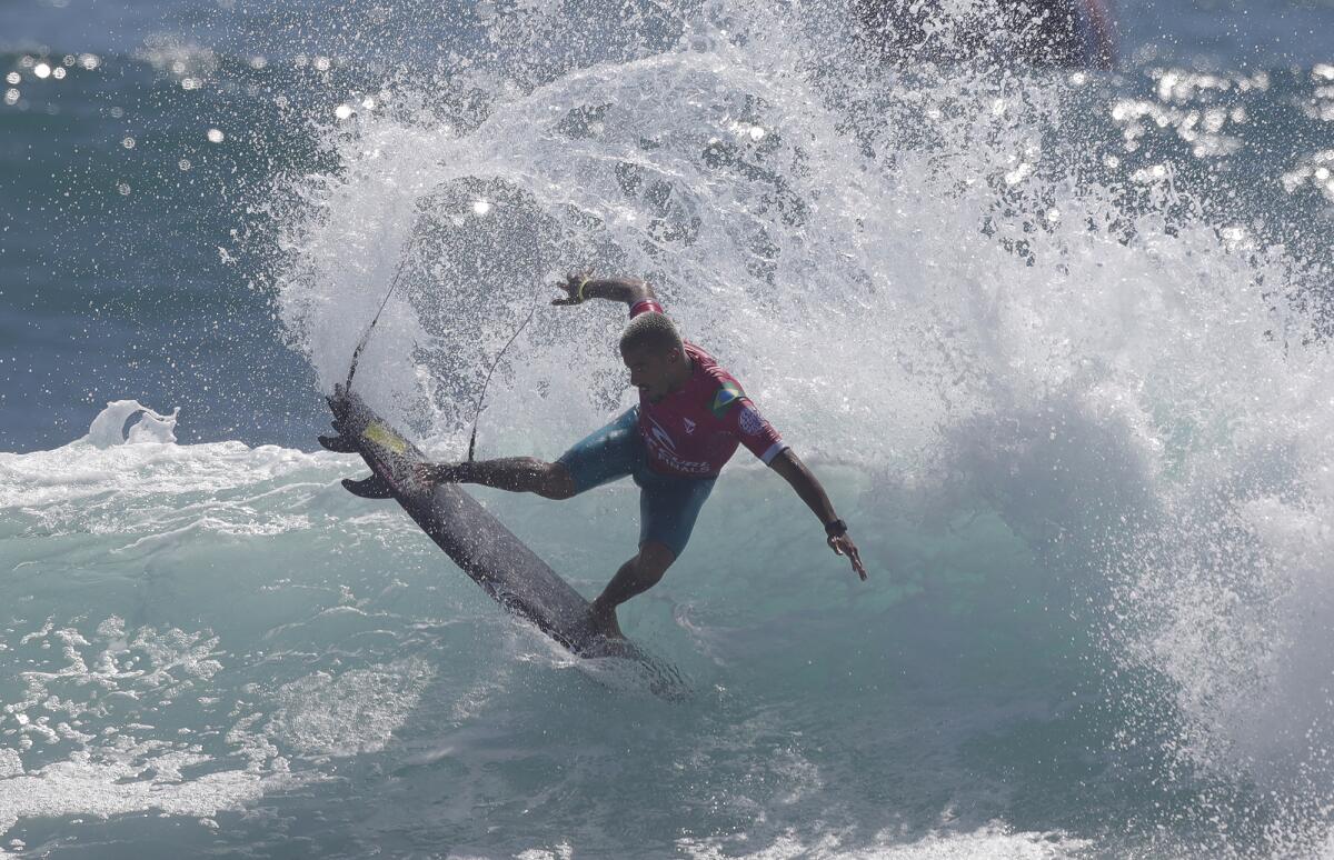 Felipe Toledo completes an air reverse in his match in San Clemente.