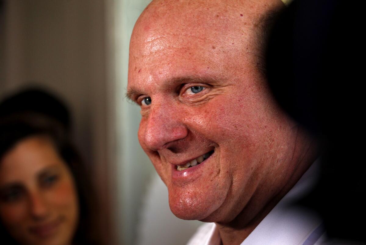 Clippers owner Steve Ballmer talks to media during a campaign to celebrate the "next era'' of Clippers basketball in downtown Los Angeles.