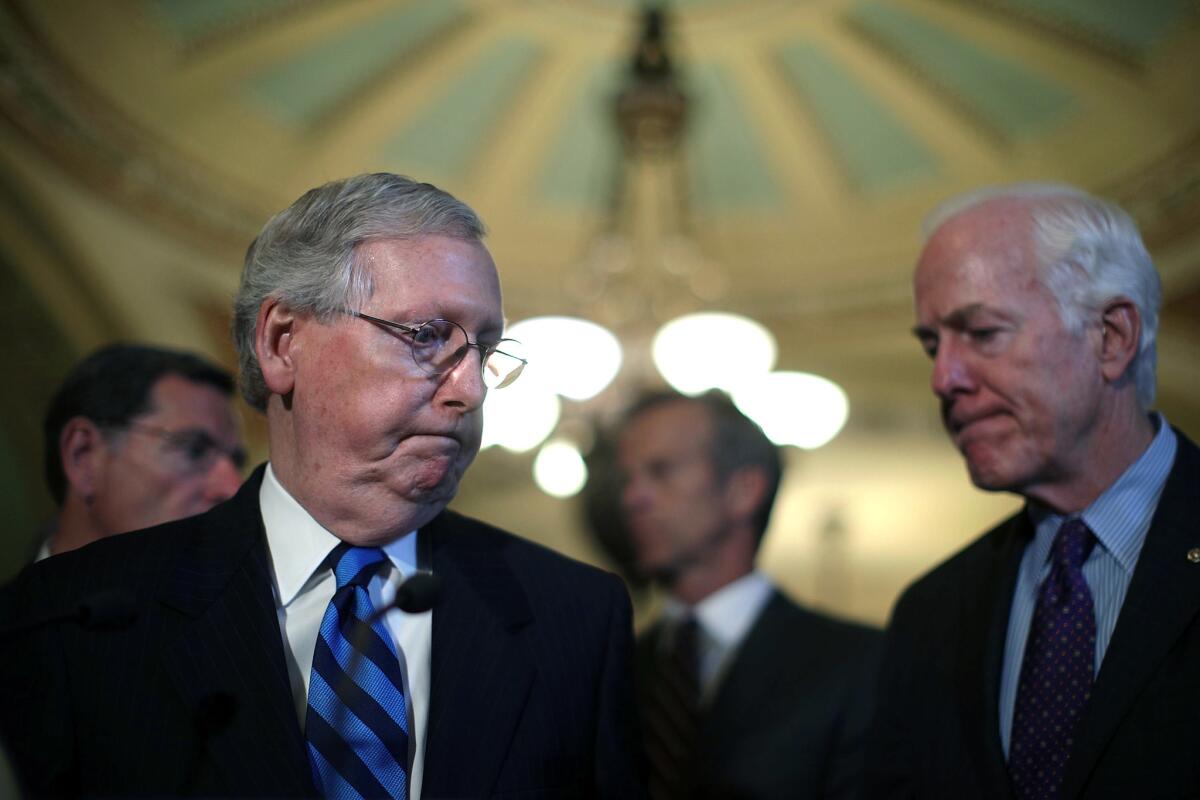 Senate Majority Leader Mitch McConnell (R-Ky.), left, and Senate Majority Whip John Cornyn (R-Texas) at the Capitol.