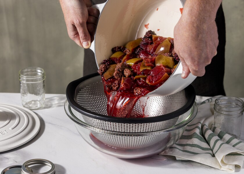 EL SEGUNDO, CALIFORNIA, May 25, 2022: Second step in making blackberry jelly with Amaro bitters