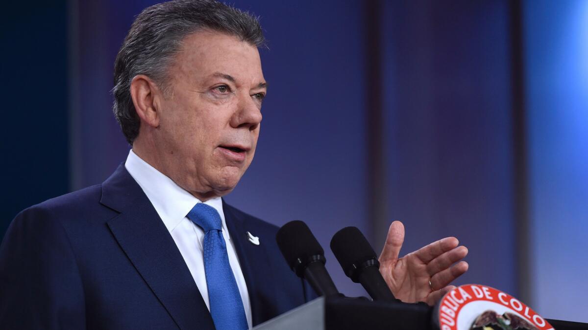 Colombian President Juan Manuel Santos speaks during a news conference at Narino Palace in Bogota.