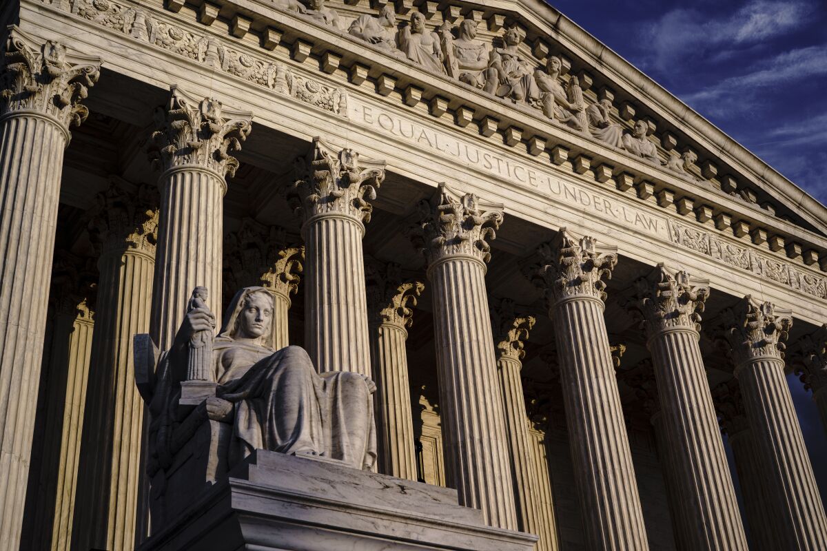 The Supreme Court is seen at dusk.