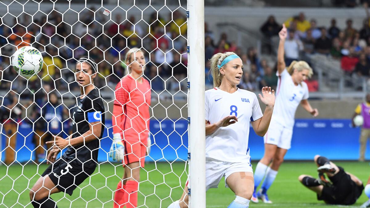 American Julie Johnston (8) watches a shot by teammate Carli Lloyd (not pictured) hit the net for a goal against New Zealand on Aug. 3, 2016.