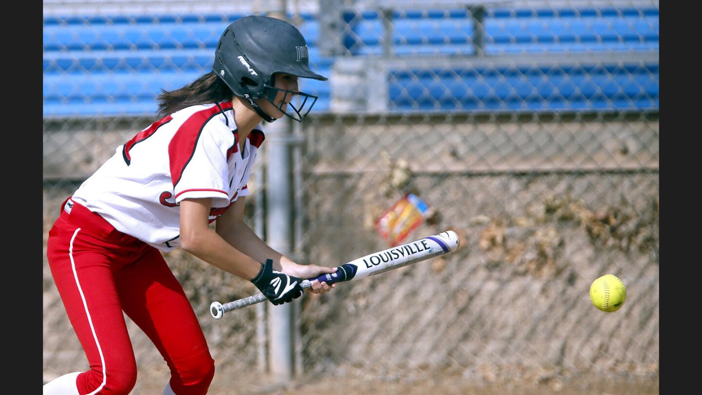 Photo Gallery: Burroughs High School softball takes home game over rival Arcadia High School