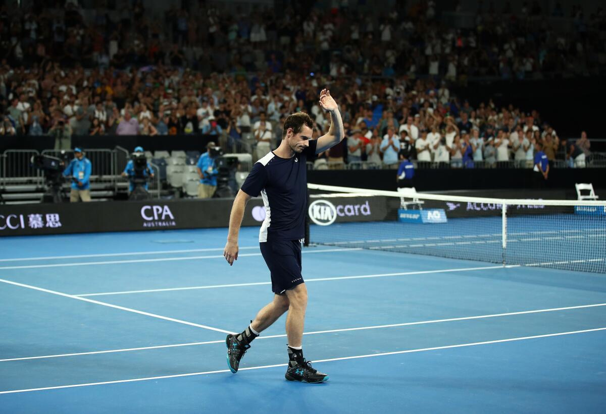 Andy Murray waves to the crowd after his first-round loss to Roberto Bautista Agut at the Australian Open on Monday.