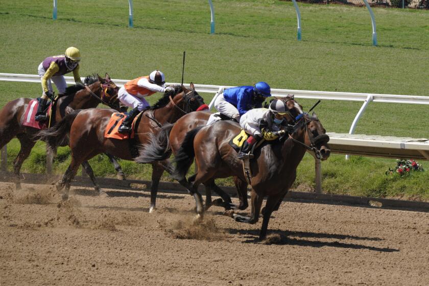 Dynamic Duo makes a run from the back on the final stretch at Del Mar Race Track.