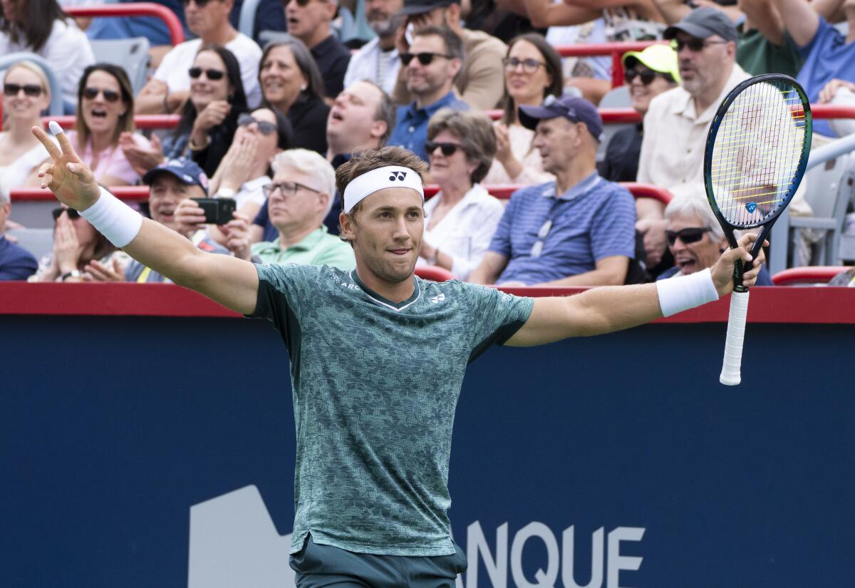Casper Ruud of Norway reacts during his match against Canada's Felix Auger-Aliassime during quarterfinal play at the National Bank Open tennis tournament, Friday, Aug. 12, 2022 in Montreal. (Paul Chiasson/The Canadian Press via AP)
