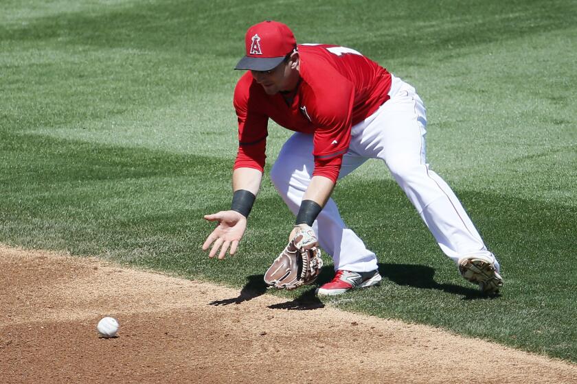 Johnny Giavotella enhanced his chances of earning the Angels second baseman position with three hits against the Cubs on Wednesday.