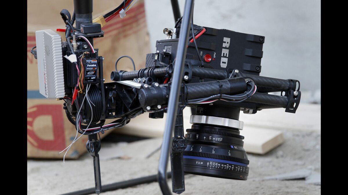 A RED Epic camera carried by a drone is used to film a scene of "Criminal Minds: Beyond Borders" in Santa Clarita. The Aerial MOB drone can carry up to a 22-pound cinema camera and travel up to 40 mph.