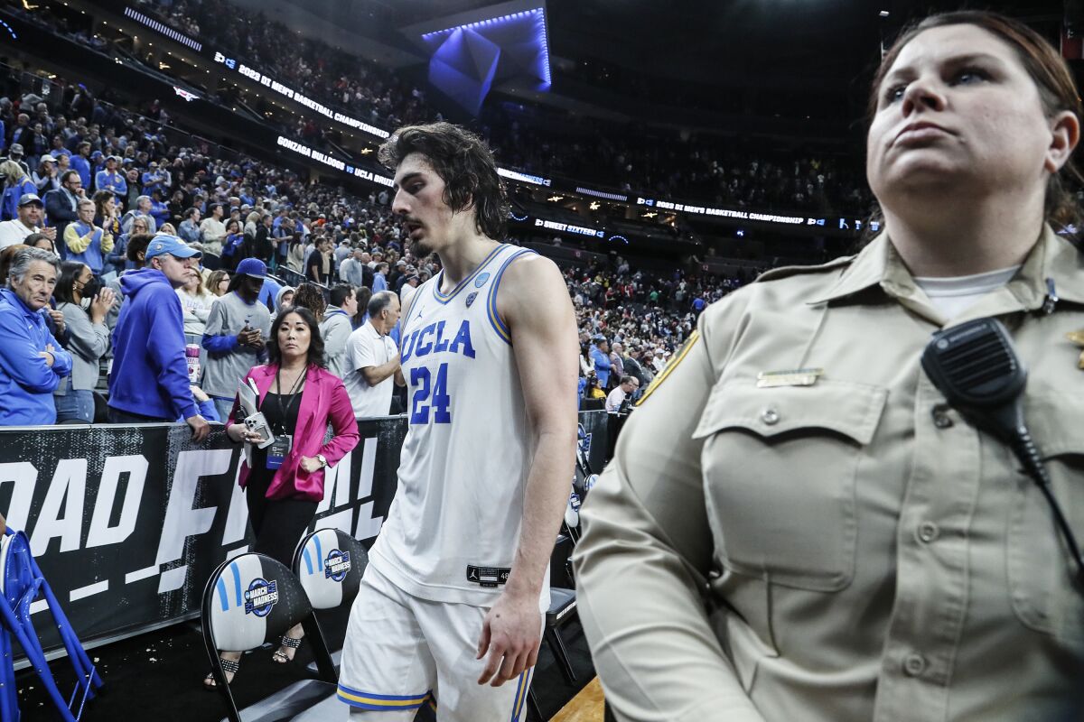 UCLA's Jaime Jaquez Jr.  (24) leaves the court after the Bruins' loss to Gonzaga in the Sweet 16 on March 23, 2023.