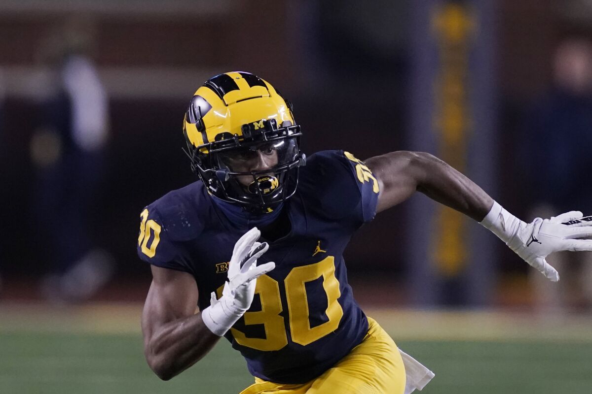 Michigan defensive back Daxton Hill pursues on defense against Indiana in November.