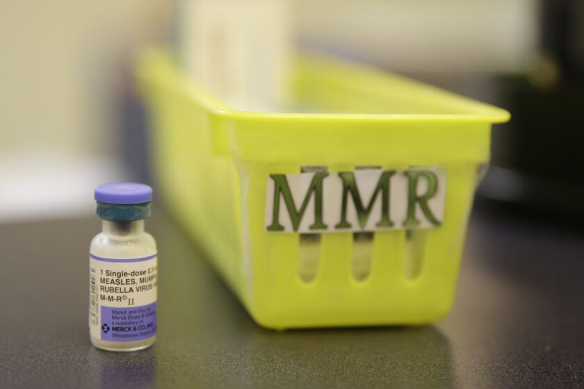 The vaccine against measles, mumps and rubella is shown at a clinic in Greenbrae, Calif.