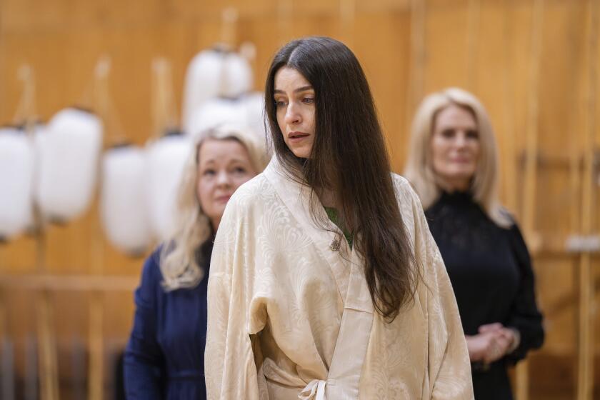 In this image provided by the Met Opera, soprano Asmik Grigorian prepares for her Metropolitan Opera debut during a rehearsal for Puccini's "Madame Butterfly." (Jonathan Tichler/Met Opera via AP)