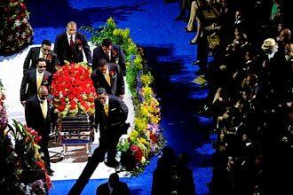 Pallbearers carry Michael Jackson's coffin.