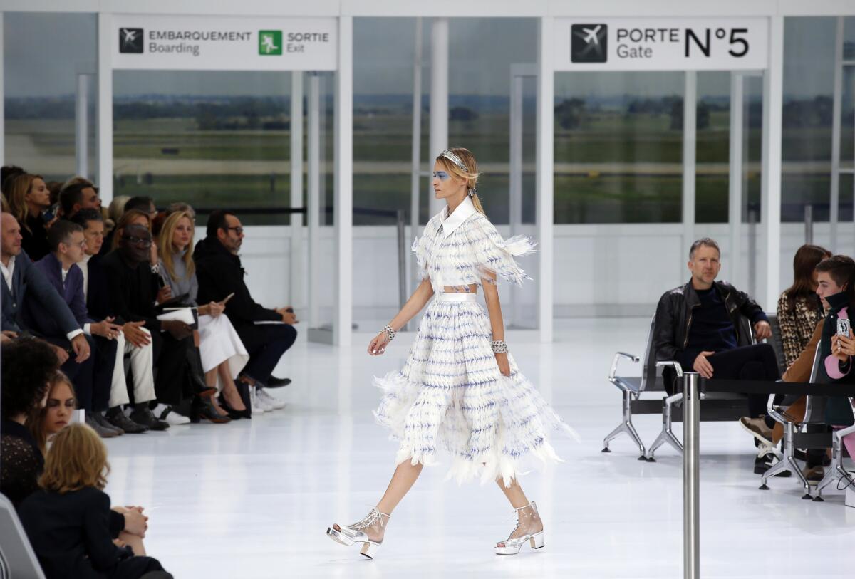 A model wears a creation for Chanel's Spring-Summer 2016 ready-to-wear fashion collection presented during the Paris Fashion Week, Tuesday, Oct. 6, 2015 in Paris, France. (AP Photo/Francois Mori)