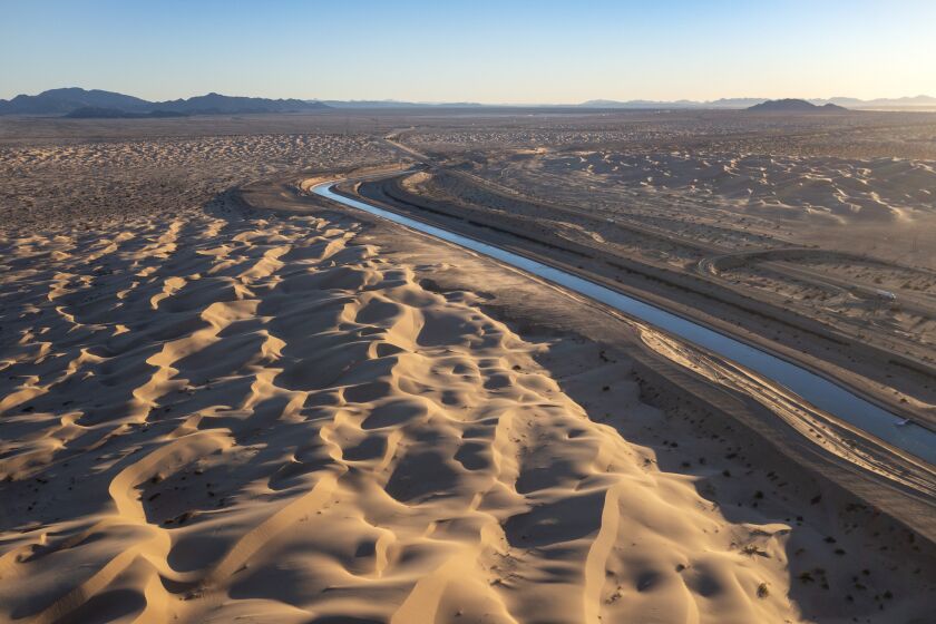 WINTERHAVEN, CA - January 27: Aerial views of the All-American Canal slicing through the Imperial Sand Dunes Thursday, Jan. 27, 2022 in Winterhaven, CA. (Brian van der Brug / Los Angeles Times)