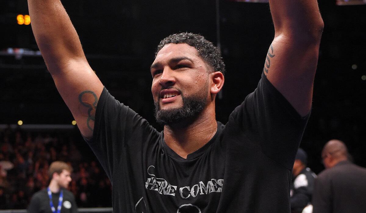 Dominic Breazeale of Upland celebrates after defeating Amir Mansour in a heavyweight match at Staples Center on Jan. 23.