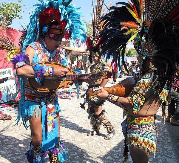 Dancers practice on instruments at the festival in honor of Cuauhtemoc in Ixcateopan, Mexico. The remains of the last Aztec leader are said to be kept in the town, though scientists are dubious the bones belonged to Cuauhtemoc.