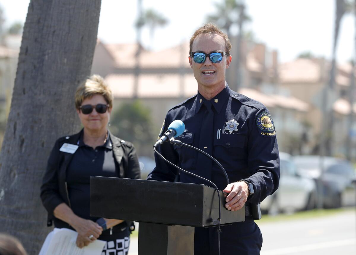 Orange Coast District State Park Supt. Kevin Pearsall makes comments during the ribbon-cutting ceremony on Monday.