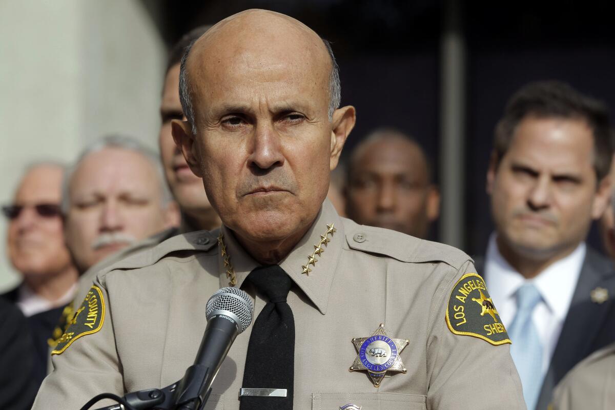 Los Angeles County Sheriff Lee Baca announces his retirement at a news conference at Sheriff's Headquarters Bureau in Monterey Park.