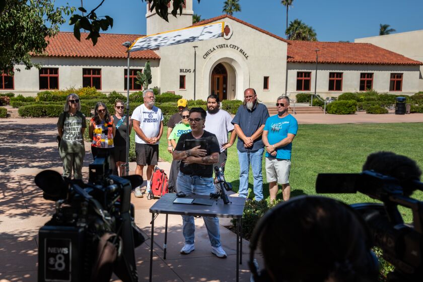 Chula Vista, CA - August 30: Mandy Lien and other homeless advocates gather for a news conference regrading the preliminary injunction filed by 15 homeless residents staying at Harborside Park at Chula vista City Hall in Chula Vista, CA on Tuesday, Aug. 30, 2022. The city will begin evicting homeless individuals from the park starting tomorrow. (Adriana Heldiz / The San Diego Union-Tribune)
