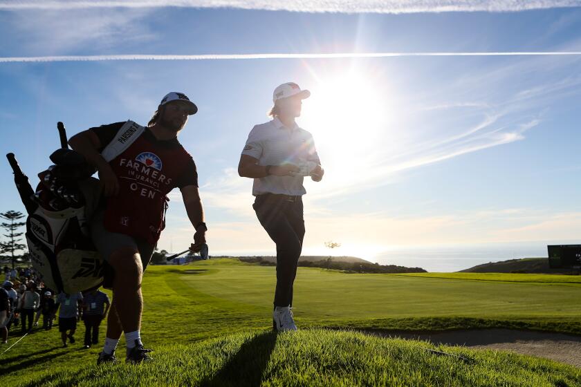 San Diego, CA - January 27: Jake Knapp walks onto the 17th green during the final round of the Farmers Insurance Open at Torrey Pines South Course on Saturday, Jan. 27, 2024 in San Diego, CA. (Meg McLaughlin / The San Diego Union-Tribune)