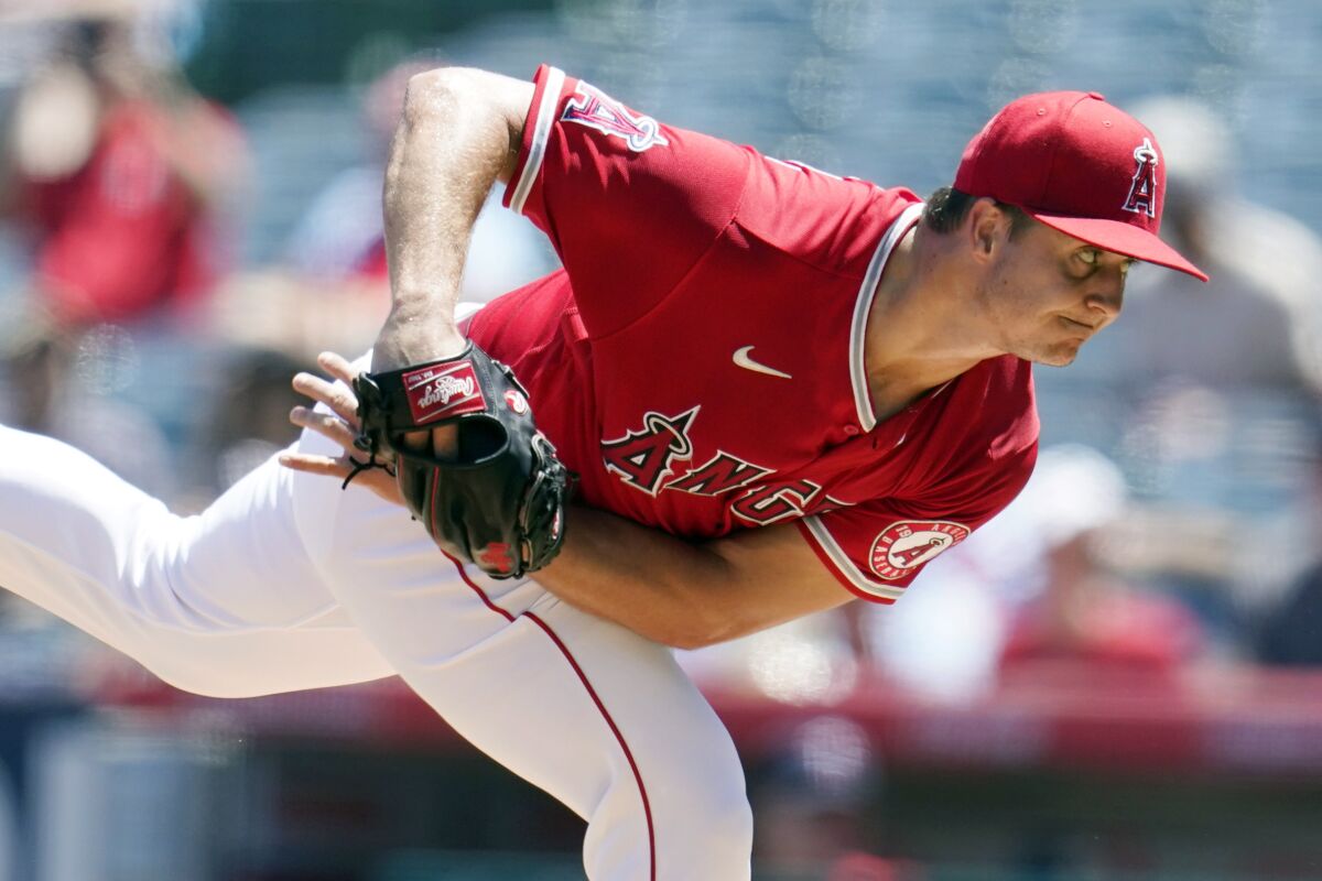 Angels pitcher Tucker Davidson follows through on a delivery.