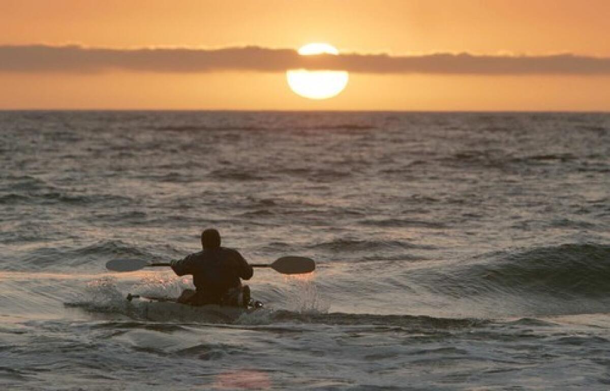 Kayaking near the Santa Monica Pier on Tuesday.