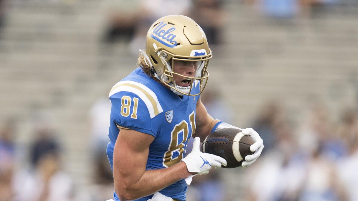 UCLA tight end Hudson Habermehl runs with the ball during a game against South Alabama in September 2022.