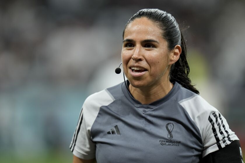 Assistants referee Karen Diaz warms up prior to the World Cup group E soccer match between Costa Rica and Germany at the Al Bayt Stadium in Al Khor , Qatar, Thursday, Dec. 1, 2022. (AP Photo/Hassan Ammar)