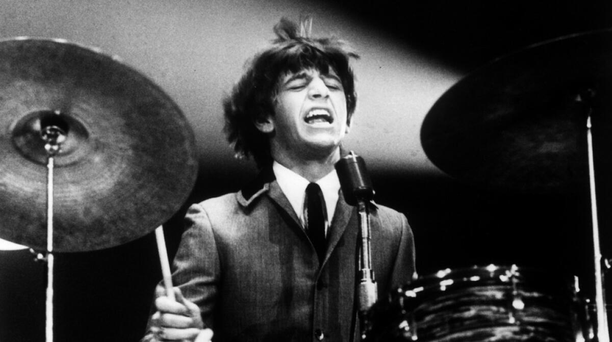 Ringo Starr rocks out at the Washington Coliseum during the band's first live U.S. concert, Feb. 11, 1964.