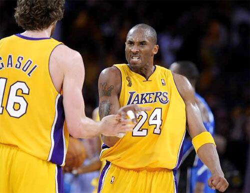 Guard Kobe Bryant and power forward Pau Gasol celebrate as the Lakers take a 20-point lead in the third quarter Thursday night.