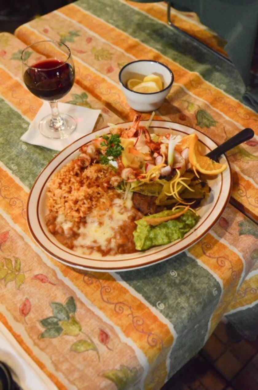 Alfonso’s most popular dish is the Carne Asada and Camaron Combo served wtih rice and beans. Photo by Kelley Carlson