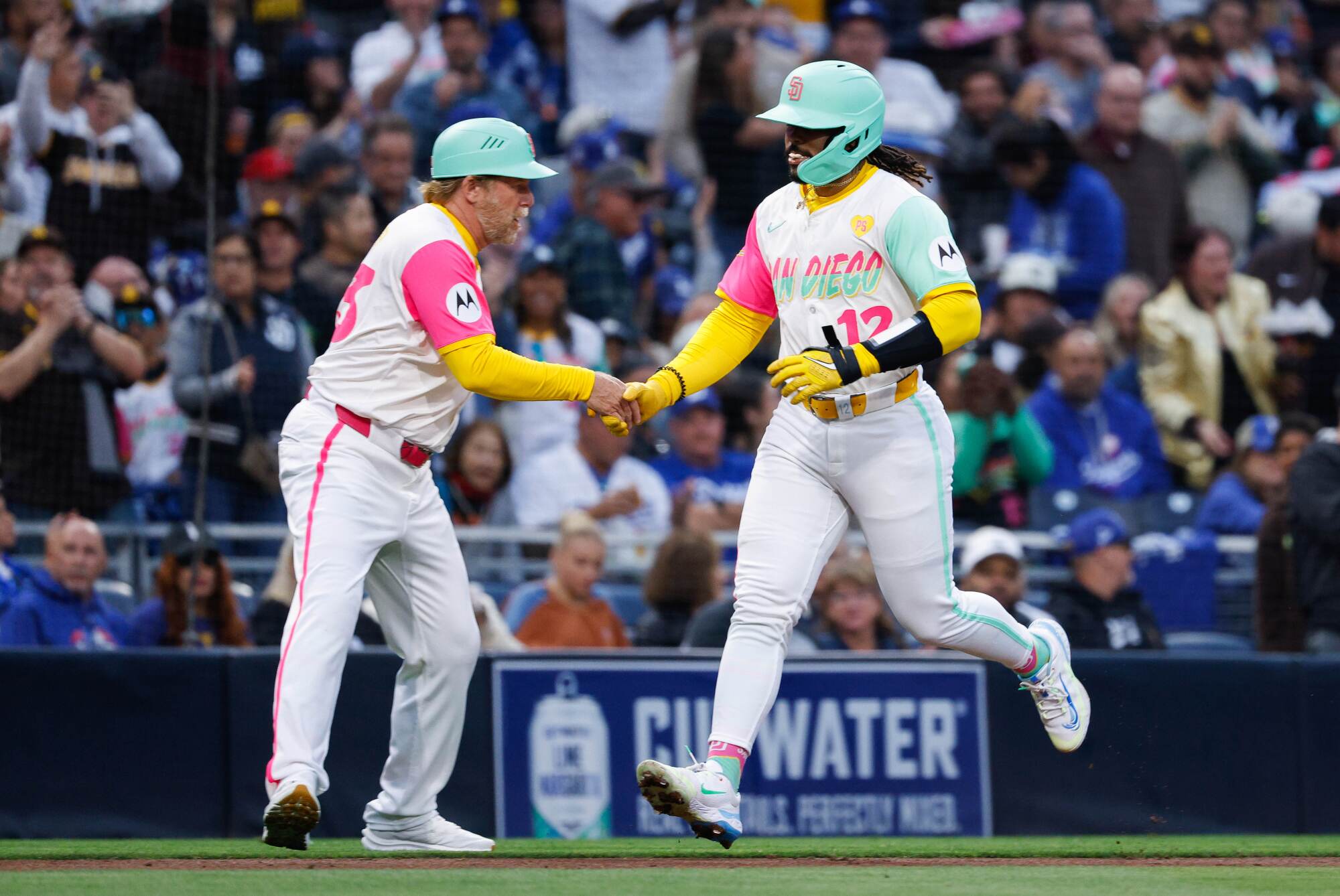 Luis Campusano (12) rounds the bases after a home run against the Dodgers.