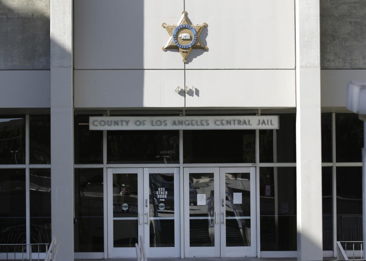 The front of the L.A. County Men's Central Jail is shown. Lawsuits involving the Sheriff's Department, which runs the county jails, contributed to a dramatic increase in the county's legal costs in 2015.