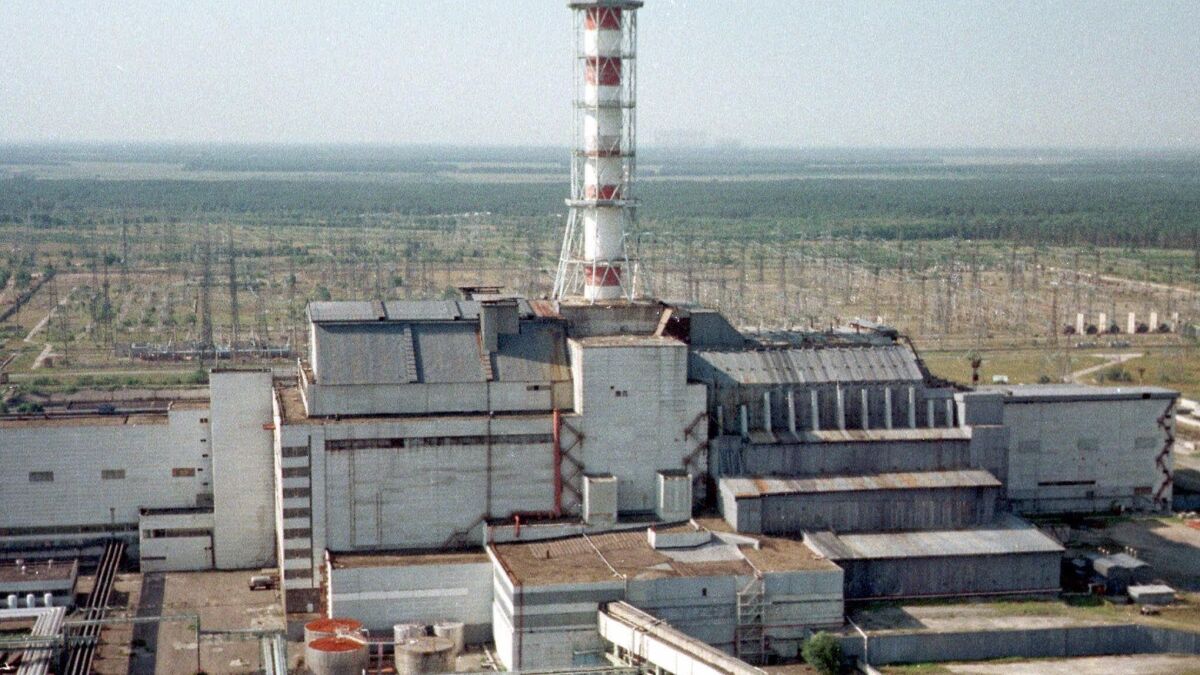 An aerial photo of the concrete-and-steel sarcophagus that entombs reactor No. 4 at the Chernobyl nuclear power plant, taken July 23, 1998, in Chernobyl, Ukraine.