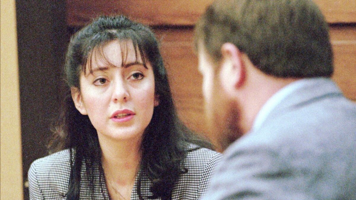 Lorena Bobbitt talks to her attorney at the start of her trial on charges of malicious wounding in Manassas, Va., on Jan. 10, 1993.