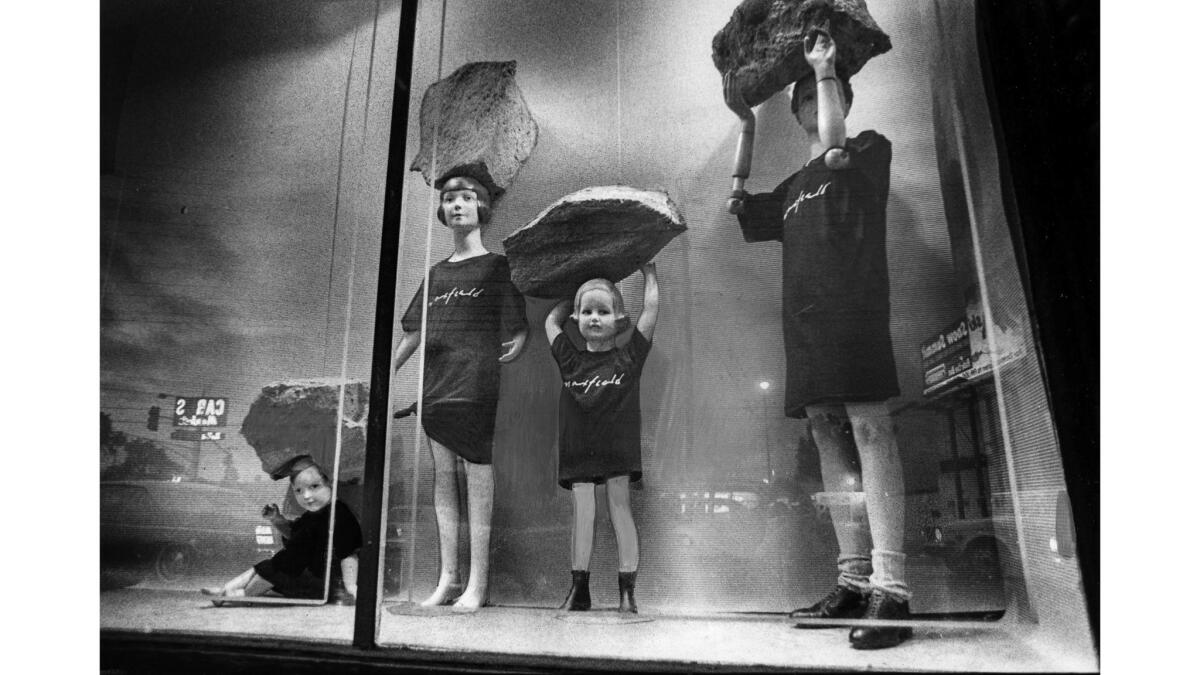 March 5, 1980: At Maxfield Bleu in Hollywood, the window display features kids playing with boulders.