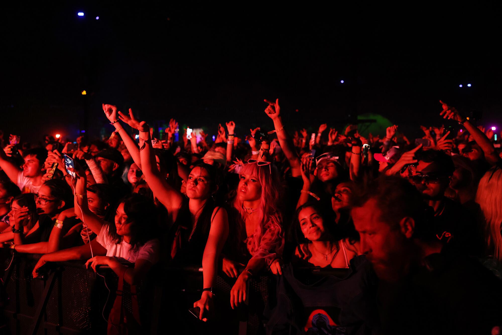 A crowd listens to headliners Swedish House Mafia.