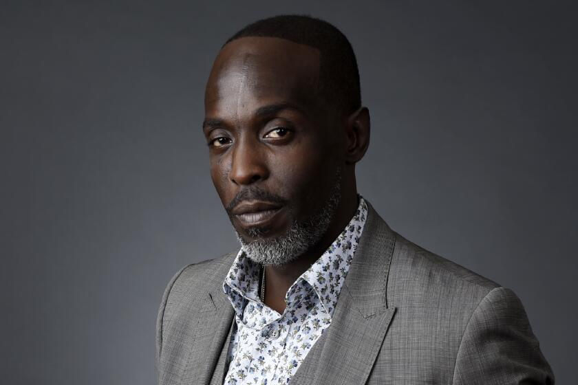FILE - Actor Michael K. Williams poses for a portrait at the Beverly Hilton during the 2016 Television Critics Association Summer Press Tour on July 30, 2016, in Beverly Hills, Calif. A federal prosecutor says four men have been charged in the overdose death of Williams, who gained fame playing Omar Little on "The Wire." New York City’s medical examiner earlier ruled that the 54-year-old Williams died of acute drug intoxication in September. (AP Photo/Chris Pizzello, File)