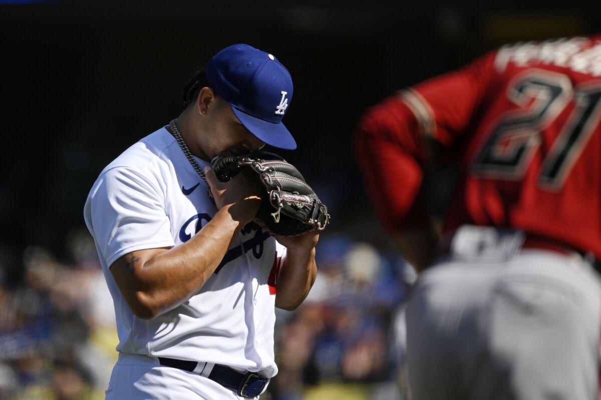 Dodgers reliever Brusdar Graterol reacts after giving up the go-ahead run against the Arizona Diamondbacks on Sunday.