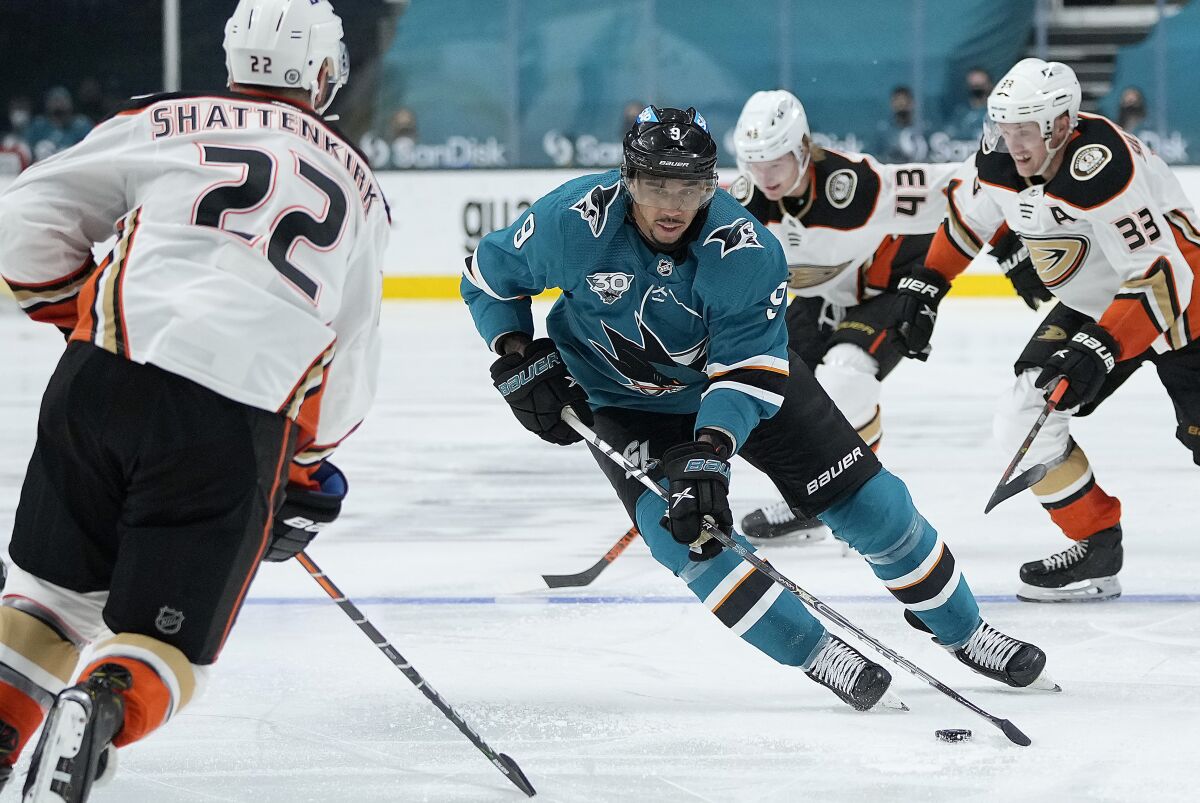 San Jose Sharks left wing Evander Kane controls the puck during a game against the Ducks in April.