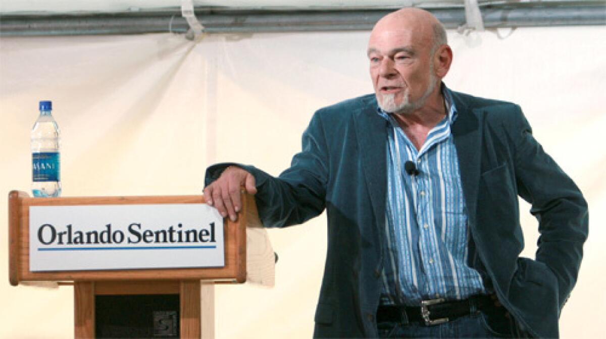 SAY WHAT? Sam Zell, the new chairman of Tribune Co., speaks to employees at one of his papers. At the event he directed a profanity at a staff member during an apparent disagreement.