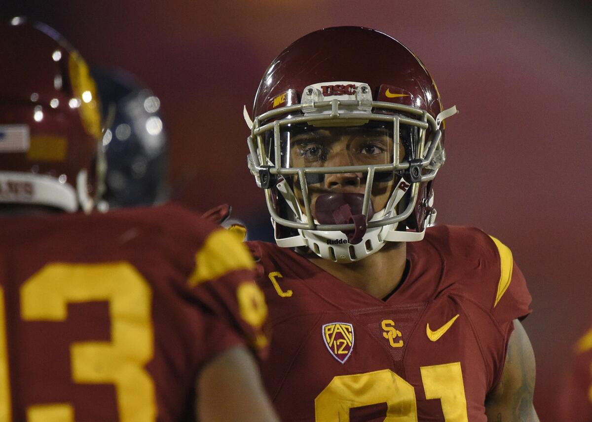 USC linebacker Su'a Cravens made 2 1/2 tackles for losses, including 1 1/2 sacks, and forced a fumble during a game against Arizona.