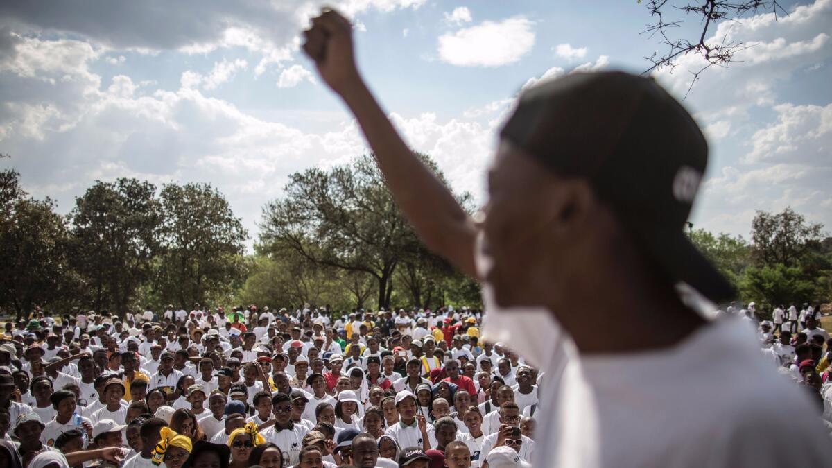 South African high school students demonstrate against announced fees hikes for tertiary education on Sept. 30, 2016, in Johannesburg.