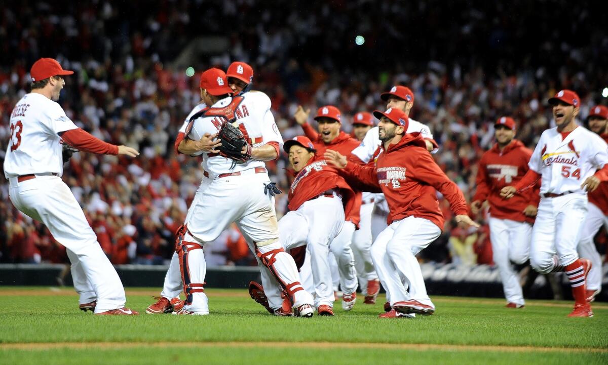 The St. Louis Cardinals celebrate their series-clinching win over the Dodgers in Game 6 of the NLCS.
